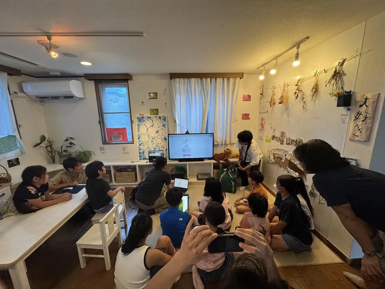 Kids exploring creative possibilities with digital tools